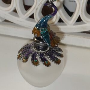 Botella para perfume pavo real