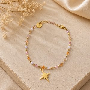 pulsera cruz cristal dorado y cuarzo rosa (8puntas)