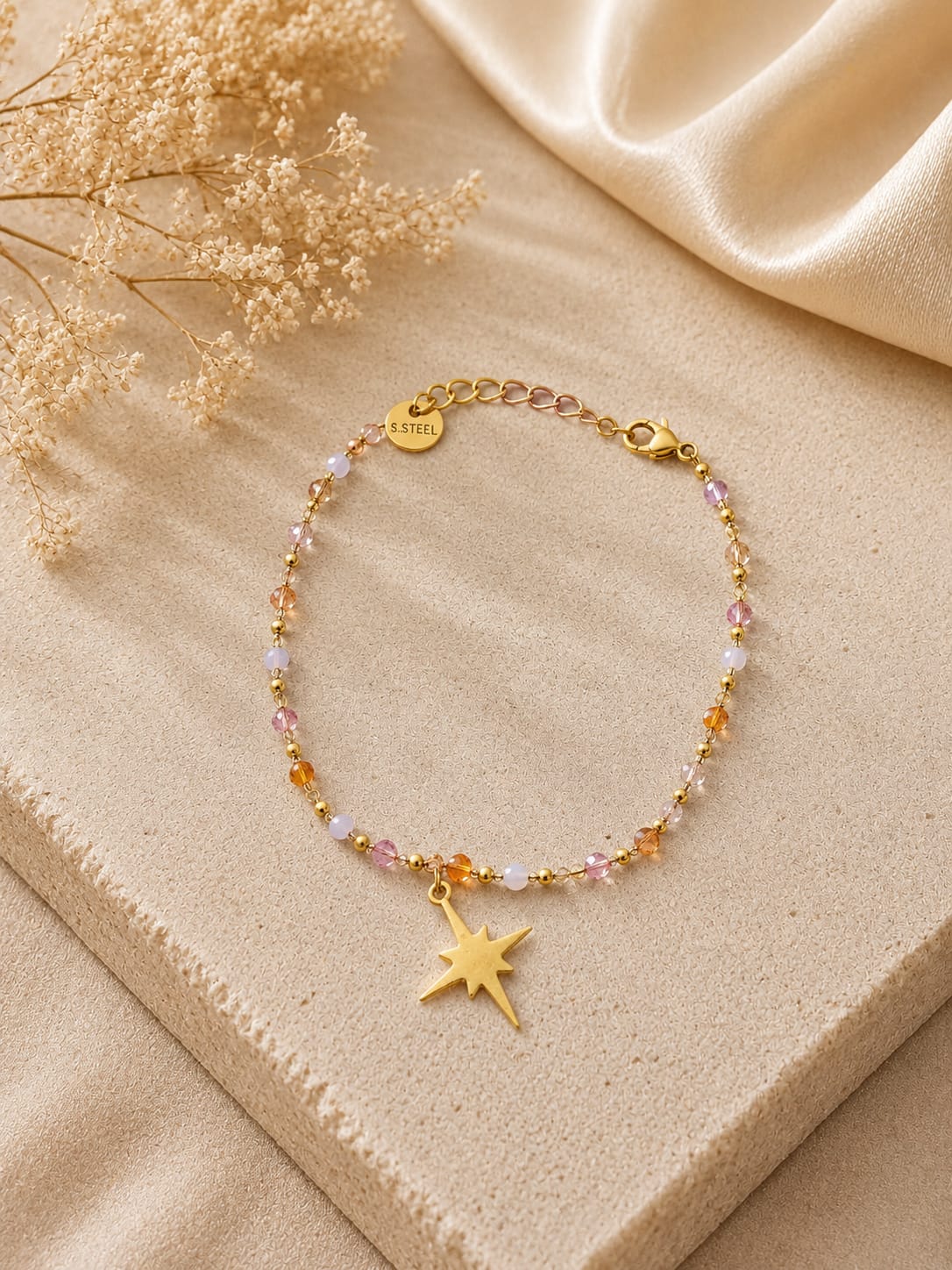 pulsera cruz cristal dorado y cuarzo rosa (8puntas)