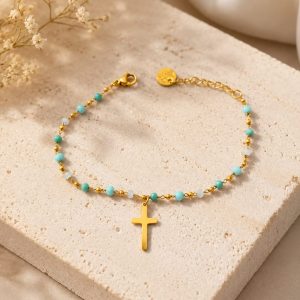 pulsera cruz cristal azul claro