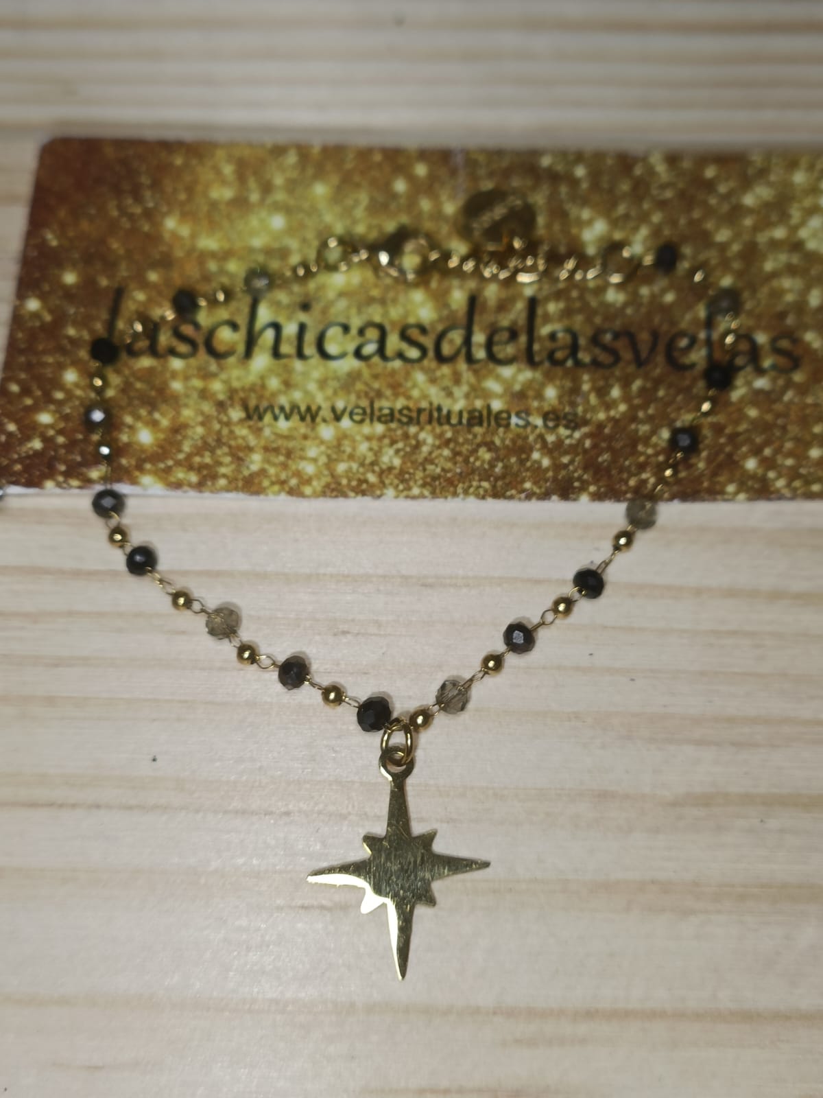 pulsera cruz cristal azul negro
