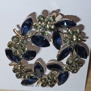 Broche de solapa hojas azules
