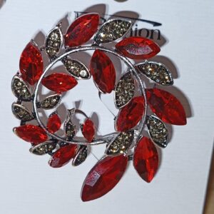 Broche de solapa hojas rojas
