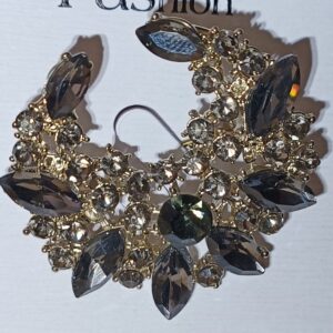 Broche de solapa hojas negras