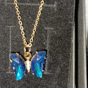 Collar mariposa azul cadena dorada