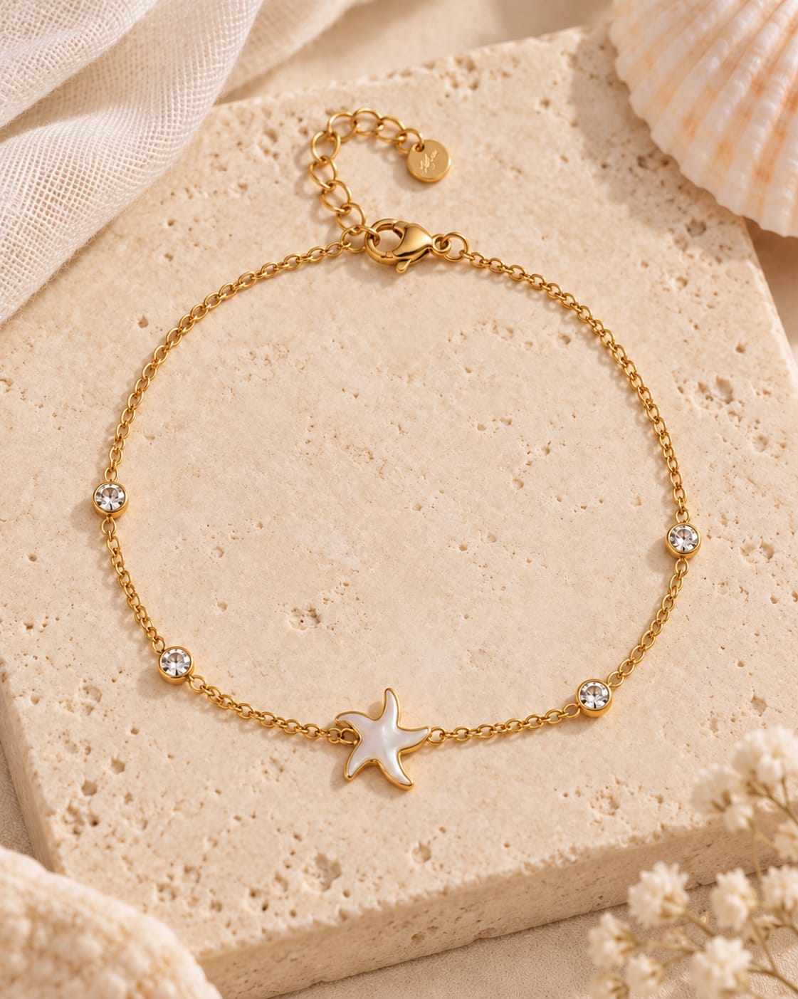 Tobillera estrella de nácar y cristales