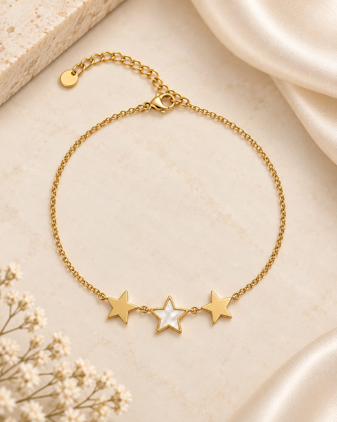 Tobillera estrella de nácar y de acero